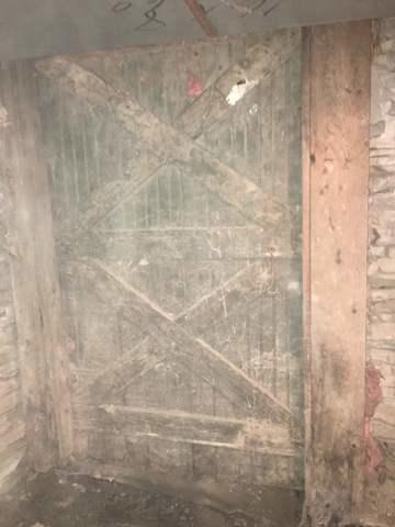 Basement Wall with wooden wall attached