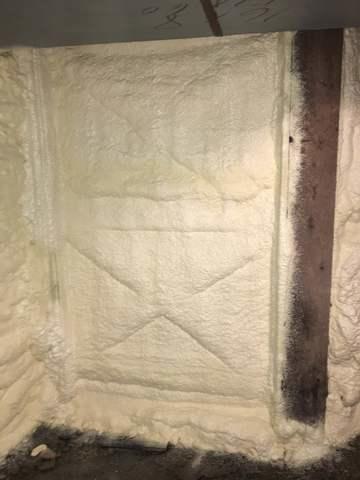 Basement Wall Insulated with Spray Foam Insulation