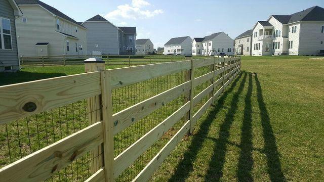 This close up view allows us to see the wire mesh that the customer had requested as they have small animals and thought this would be a great addition to their new fence.