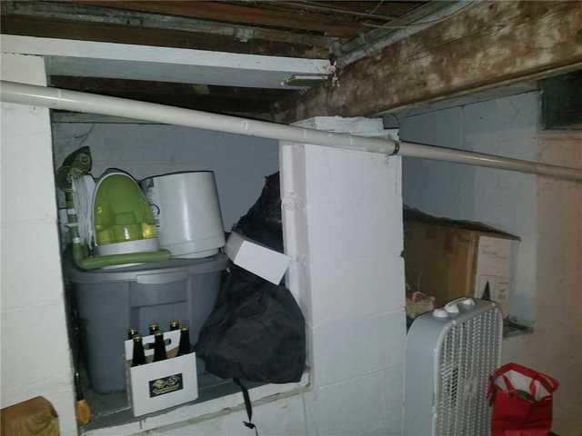Warped Support Beam in Wet Basement