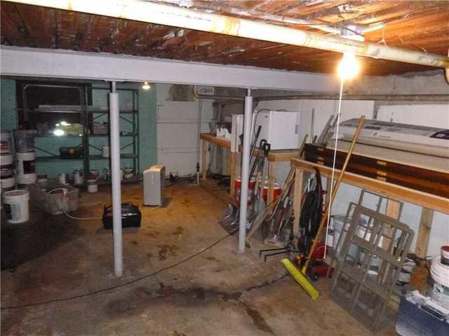 Water Coming Through Floor in Basement