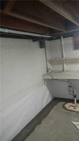 Wet basement floors and walls in Salisbury Maryland