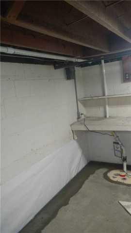 Wet basement floors and walls in Salisbury Maryland