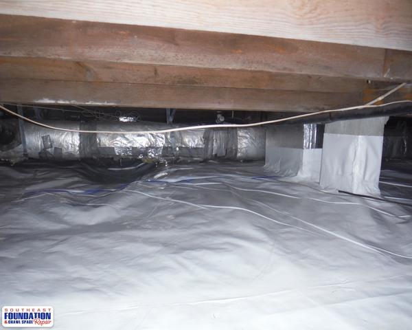 The CleanSpace Crawl Space Liner stops water vapor from flowing up from the soil, stops water vapor from flowing though the crawl space walls, and allows water to drain from the walls to where to sump pump is located.