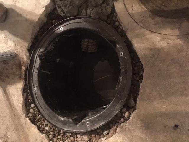 Our production team dug out a new pit for the sump pump and connected our drain tile system so the water could freely flow into it.