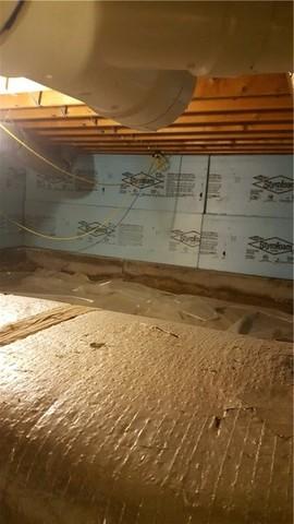 This photo shows what we began with . The first step was to remove the debris and regrade the crawlspace