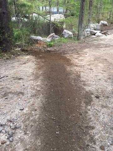 Discharge is buried in the dirt