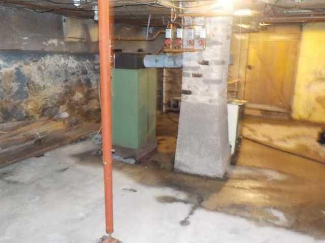 Flooded Stone Wall Basement