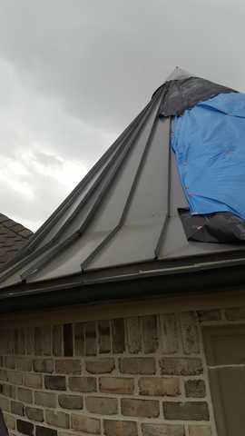 This is what "small tornadoes" and "funnel clouds" can do to your roof!