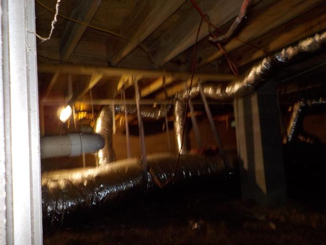 A significant amount of conditioned air is lost in this large crawl space.