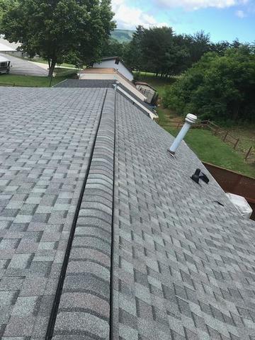 New CertainTeed Landmark Architectural Shingles in Colonial Slate with ridge vent.