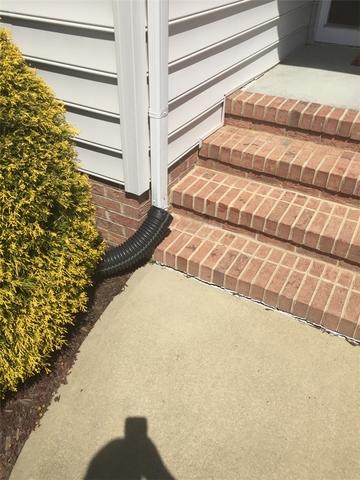 This is some of the sinking slab that this homeowner in Quantico, MD experienced on his front porch.