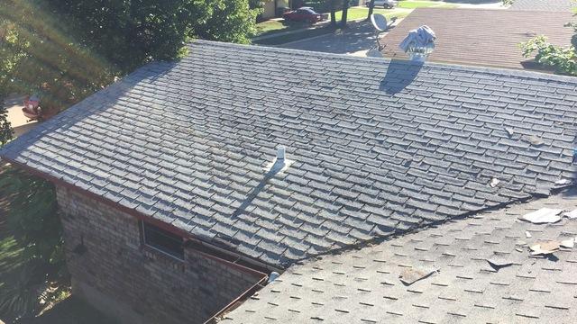 <p>Bad decking below the shingles resulted in this sag in the roof.</p>