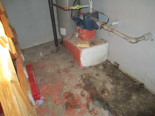 Water Damaged Floor in Wet Basement