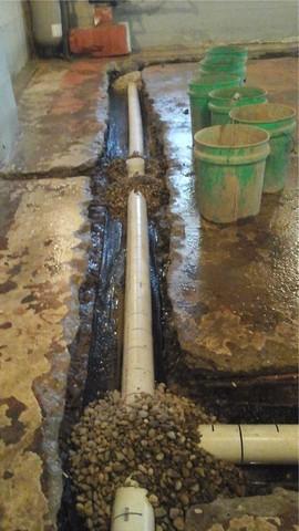 Crosstile Expedites Water Discharge in Overwhelmed Basement