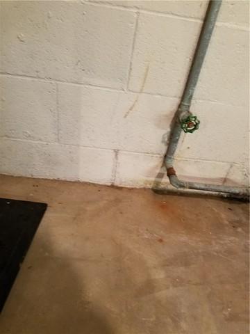 Water Damage Where Walls Meet Floor