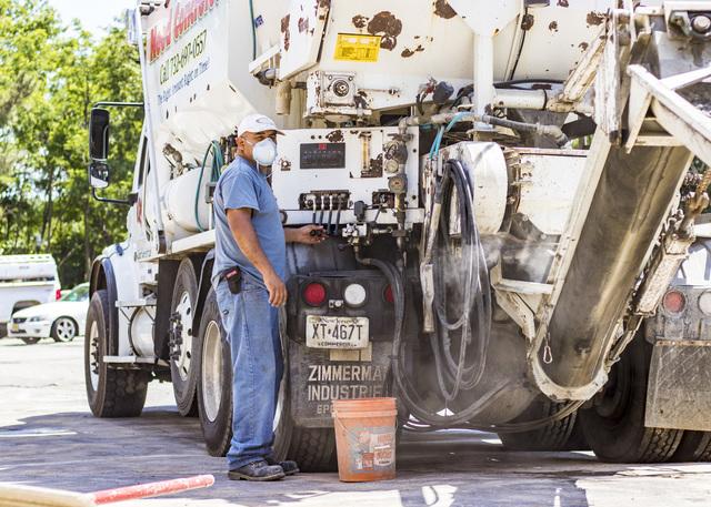 Carlos, the Concrete Specialist,  operates the concrete truck and starts to make fresh concrete.