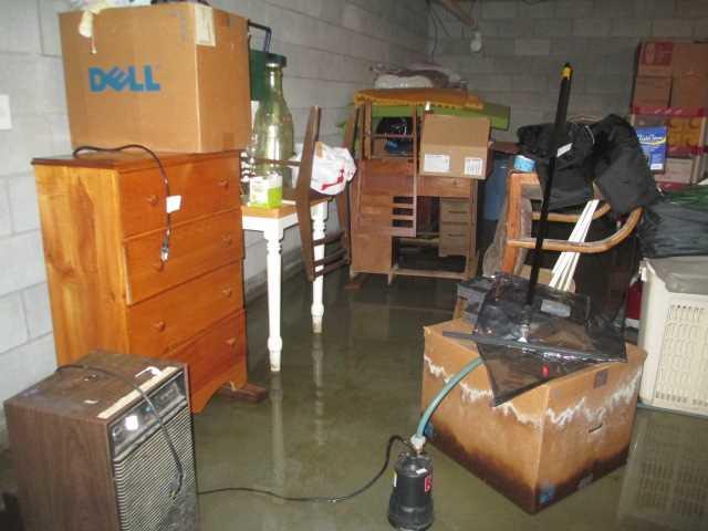 Ruined Possessions in Wet Basement