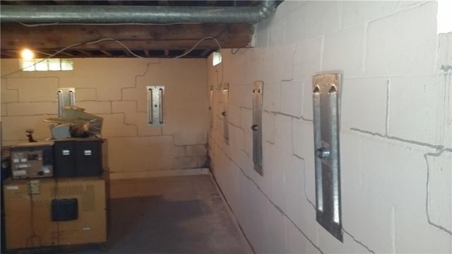 Expansive Bowing Walls in Basement