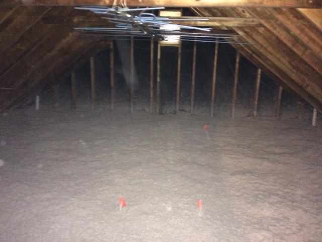 Attic flat is completely covered in cellulose, increasing the R-Value(resistance to heat flow) of the insulation to R-60