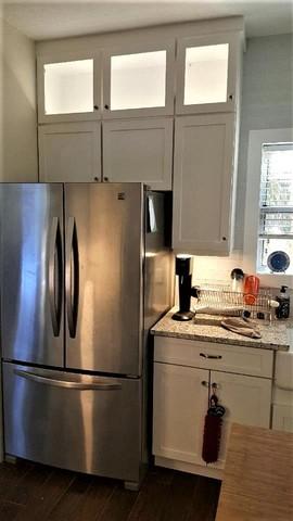 A Large Refrigerator Replaces the Old One