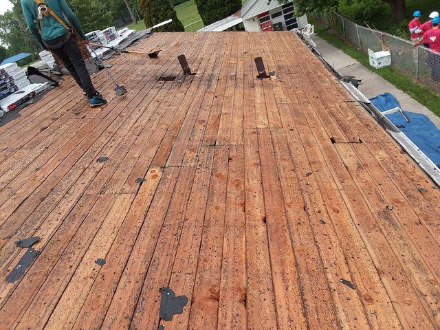 We stripped the roof down to the wood deck