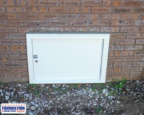 By installing the a Custom Cult Door not only do we install a water tight door but also attractive entrance to the crawl space of the home.