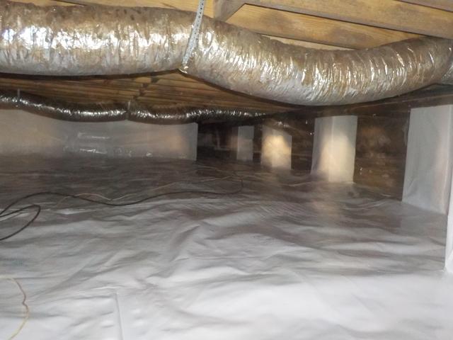 For groundwater a sump pump system is installed along with a patented Cleanspace crawl space encapsulation system.