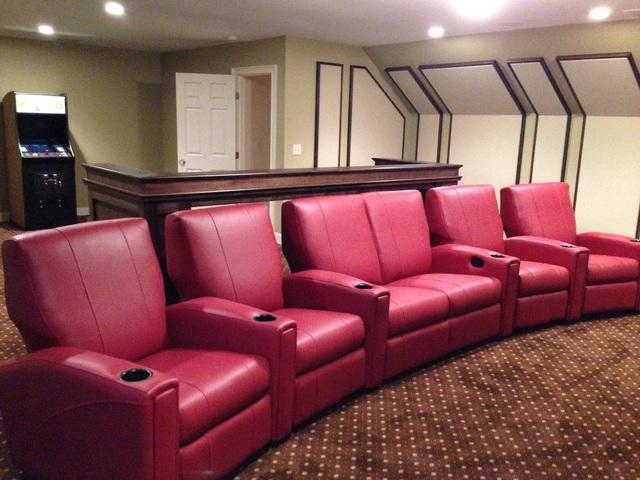 Vibrant Colored Chairs for Attic Theater Installation