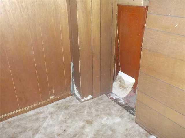 Wood Panels Peel in Wet Basement