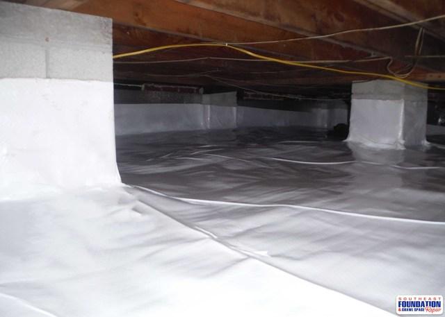 The CleanSpace Encapsulation System brightens up the crawl space by using the available light and using the white liner to bounce the light around the crawl space making it a more visible area.