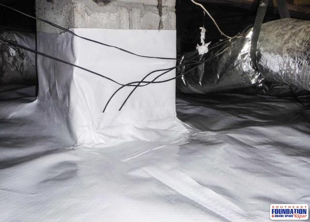 The CleanSpace Liner is wrapped around the piers of the crawl space to ensure that the crawl space is free from water entering the crawl space from the earth's ground.