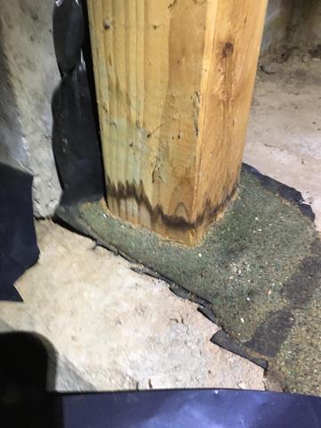 You can see where water was at on the wooden post. Even though the water is gone that wood absorbs the moisture, causing it to rot and weaken.