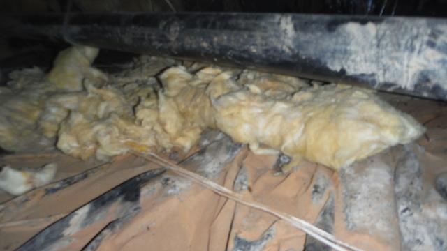 Falling fiberglass insulation
