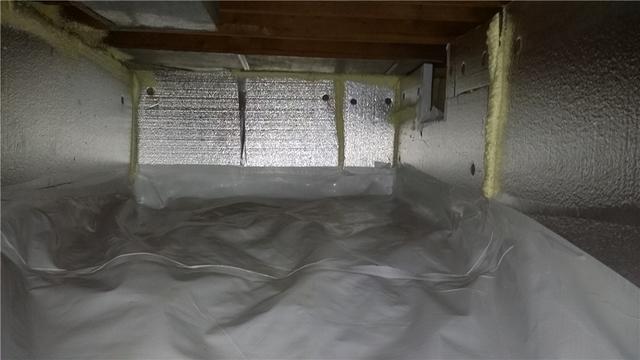 Small Crawl Space Encapsulated for Humidity Protection and Energy Savings