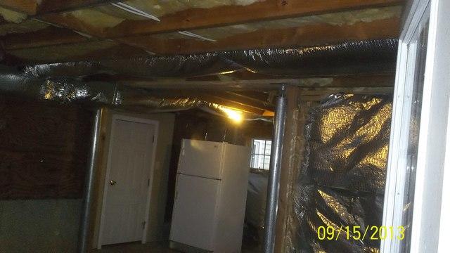 <p>This picture features the new Smartjack and supplemental beams installed in the basement.</p>