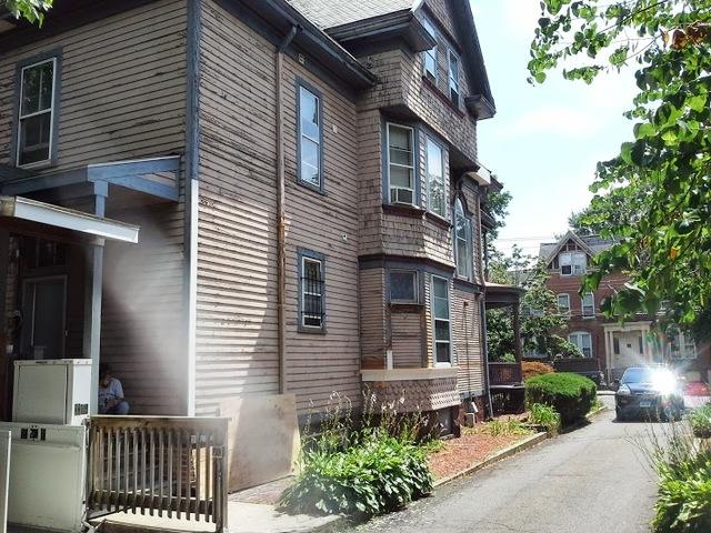 deteriorated siding before