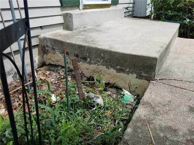 This homeowner can safely greet guests at their front porch again in Laurel, MD. PolyLevel was used to fill the void and level the front landing.