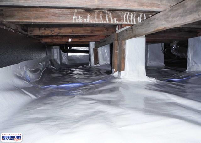 Our crew can cut the CleanSpace Liner to be custom fitted around objects in the crawl space such as pipes and piers.