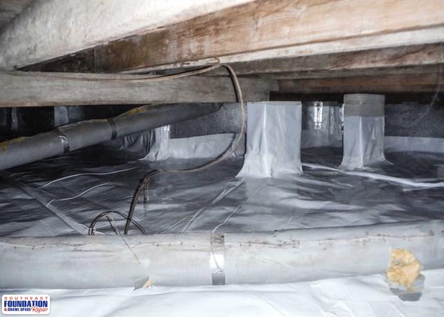 A completed CleanSpace Encapsulation System done by Southeast Foundation and Crawl Space Repair should have a bright glowing crawl space due to the white CleanSpace Liner.