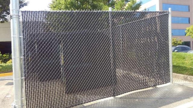 <p>M.C. Fence install this dumpster enclosure in Fairfax Vienna. &nbsp;8' high galvanized chain link with Black privacy slats. &nbsp;</p>