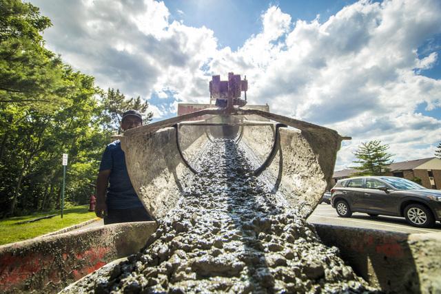 Pouring Into a Wheelbarrow.