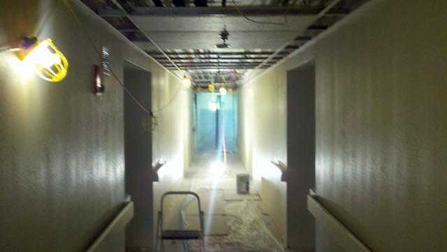 <p>A picture of the hallway in this hotel before our work started.</p>