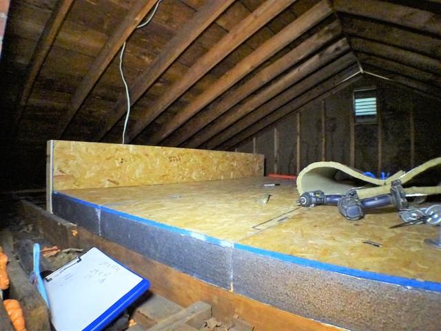 SilverGlo insulation board is installed and covered using plywood sheeting.