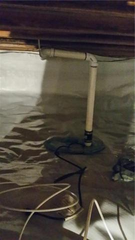 Super Sump Pump Discharges Water from Crawl Space