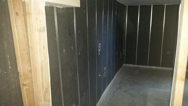 We put the basement to beautiful panels in which are foam insulation panels that have electrical chases in it with metal studs.