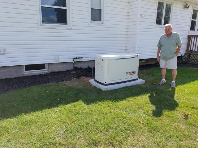 Rochester, NY homeowner with his Generac generator