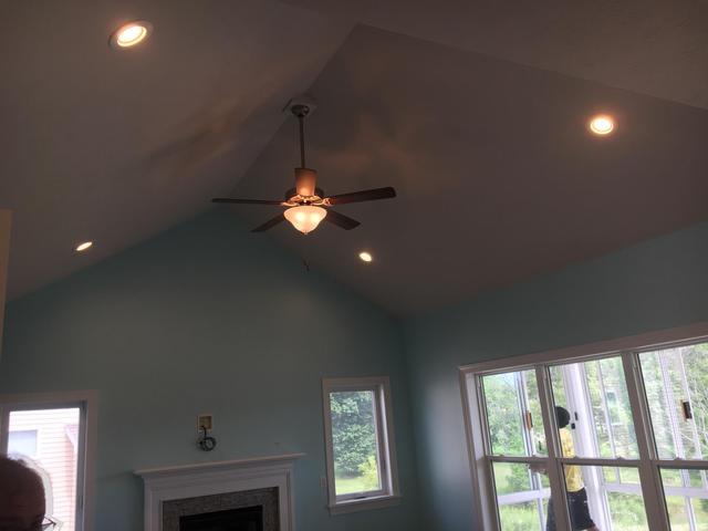 Installation of ceiling lighting with fans in this Henrietta, NY build