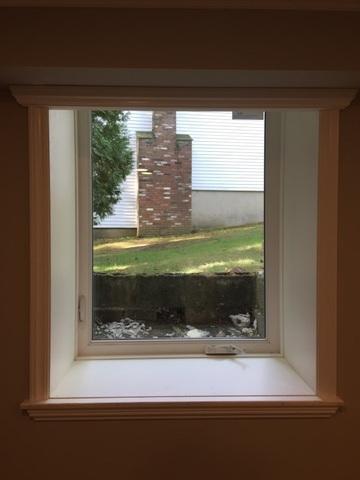 Window inserts brighten up any basement. This Stamford basement looks incredible!