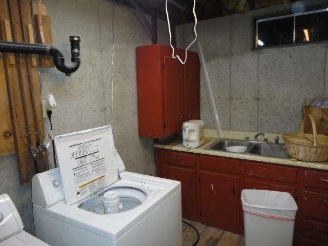 Unfinished Basement Laundry Area in Ashford, CT